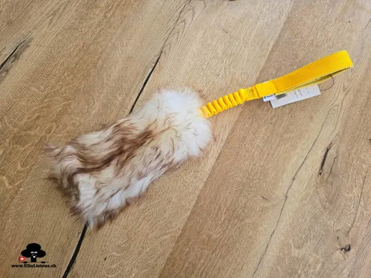 Sheepskin Mouflon fur (mix brown and white) tug toy with bungee handle yellow